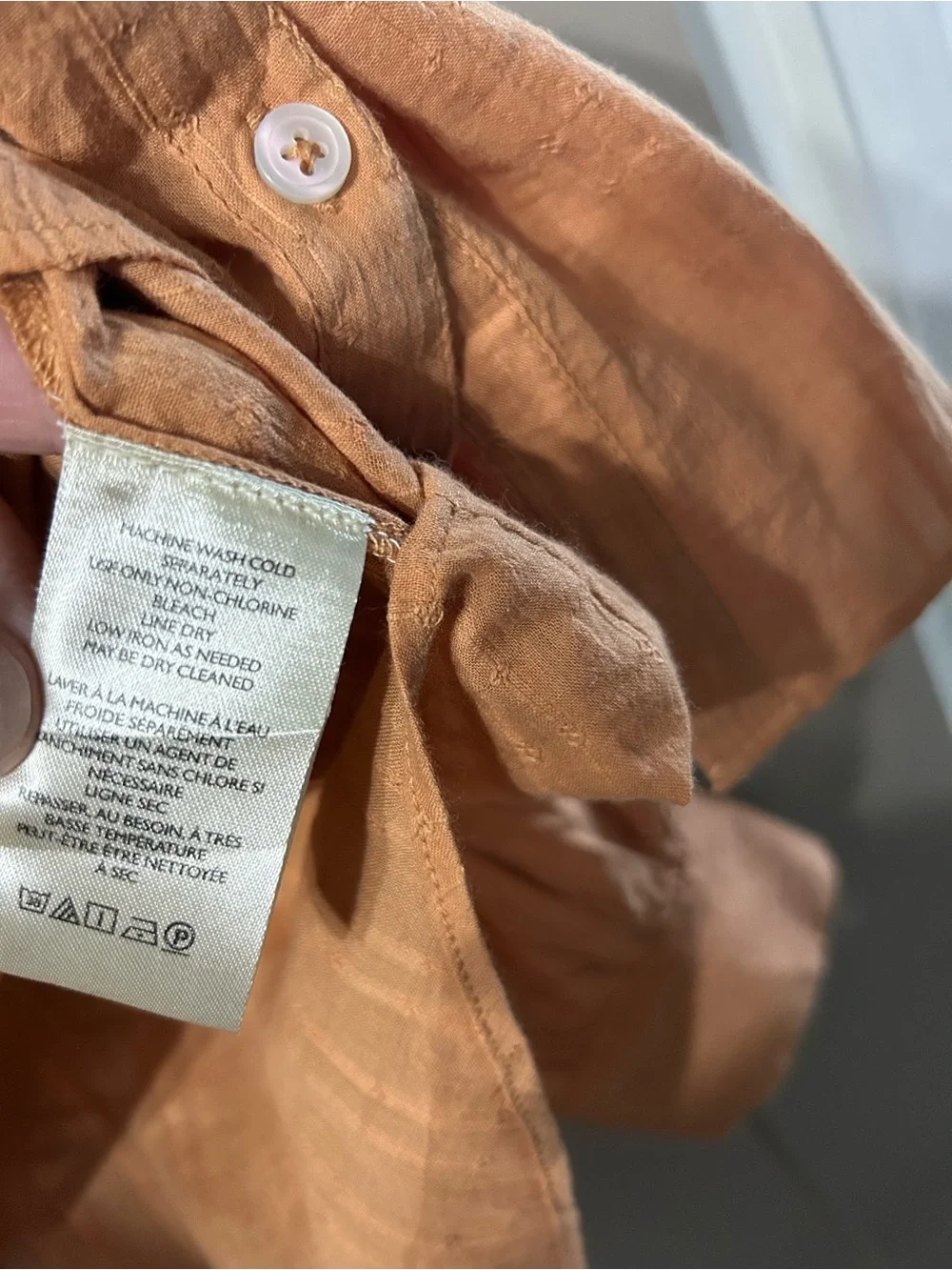 Free People Marigold Button Down Top in a burnt orange color